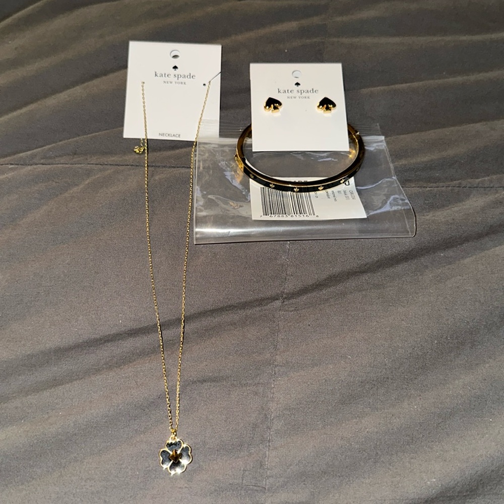 Kate Spade matching necklace, bracelet & stud earrings. Gold with black.